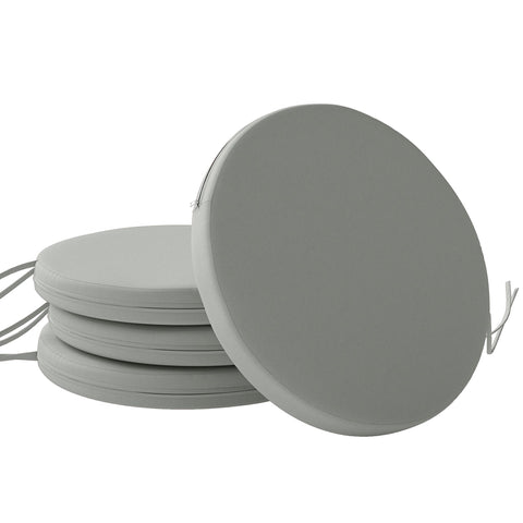 Gray round outdoor seat cushion with soft fabric cover and ties for easy attachment perfect for outdoor seat cushions