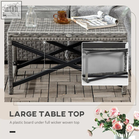Outsunny outdoor coffee table in mixed grey woven wicker with black metal x-shaped frame and plastic board underneath