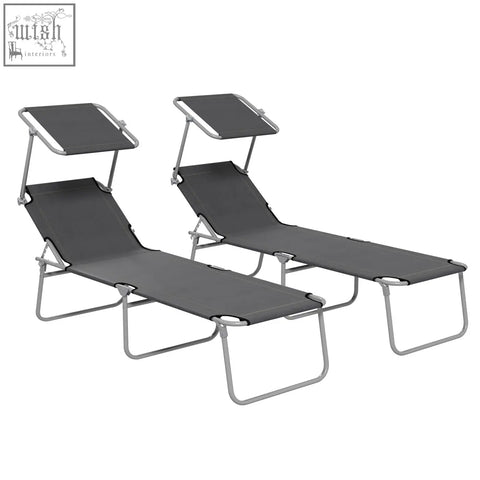 Two grey fabric reclining sun loungers with silver metal frames and adjustable canopies for outdoor use