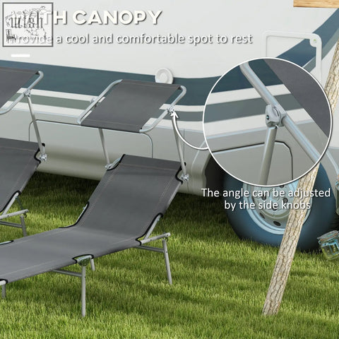 Gray fabric reclining sun lounger with foldable canopy and silver metal frame for outdoor relaxation