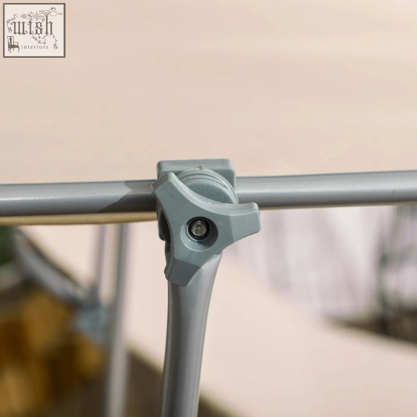 Gray plastic clamp securing metal rod on outsunny reclining sun lounger with adjustable backrest and sun shade awning