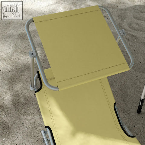 Yellow fabric reclining sun lounger with foldable table and silver metal frame from outsunny outdoor set