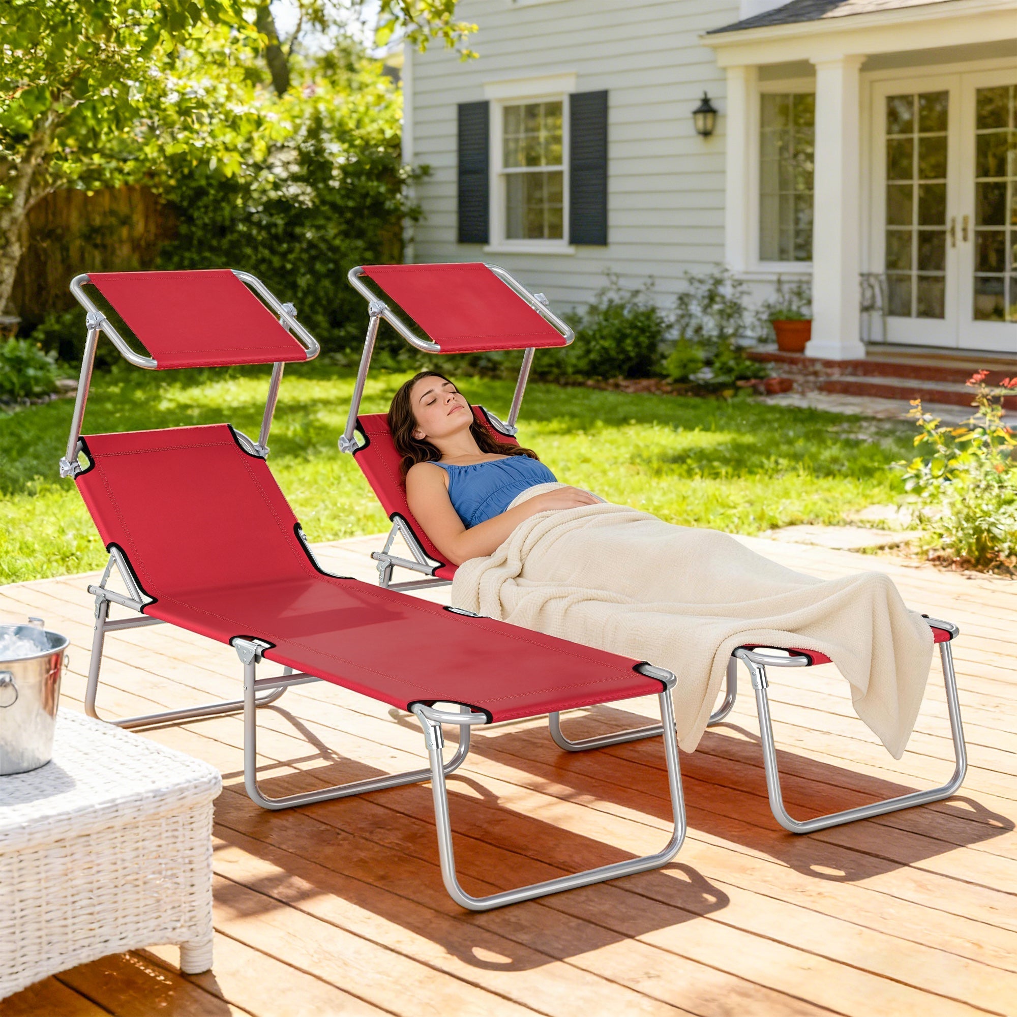 Red fabric reclining sun lounger with silver metal frame and integrated canopy by outsunny for outdoor use