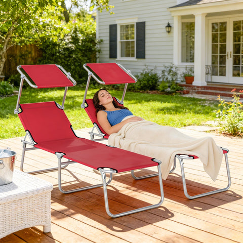 Red fabric reclining sun lounger with silver metal frame and integrated canopy by outsunny for outdoor use