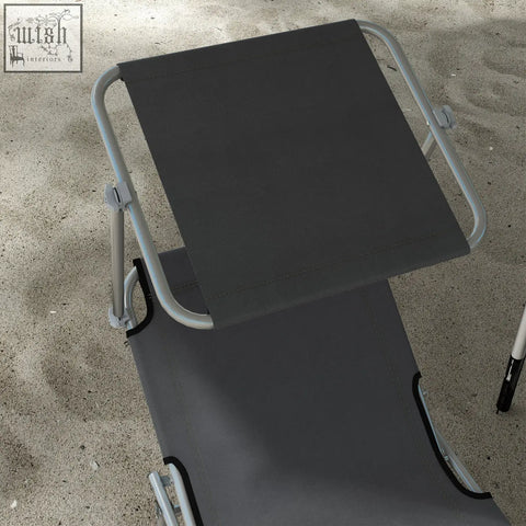 Gray fabric recliner sun lounger with silver metal frame and adjustable headrest perfect for patio or garden use