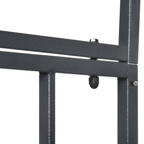Black metal frame with textured finish and bolts on dark grey Outsunny garden arbor for climbing plants