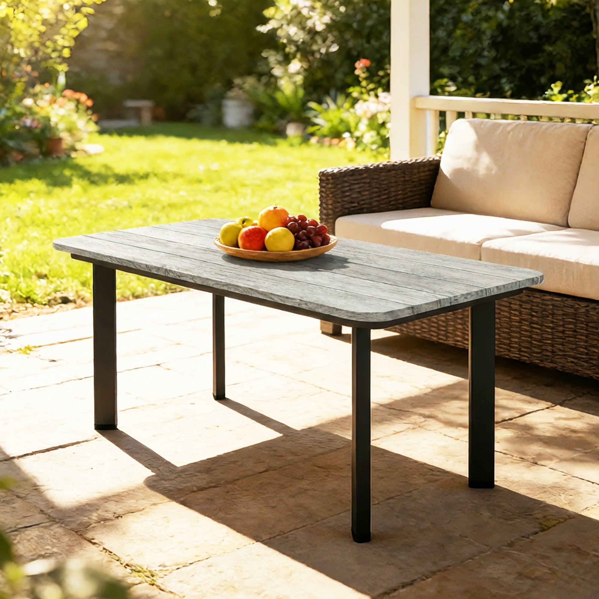 Outsunny outdoor garden coffee table with gray stone top and black metal legs perfect as a garden coffee table