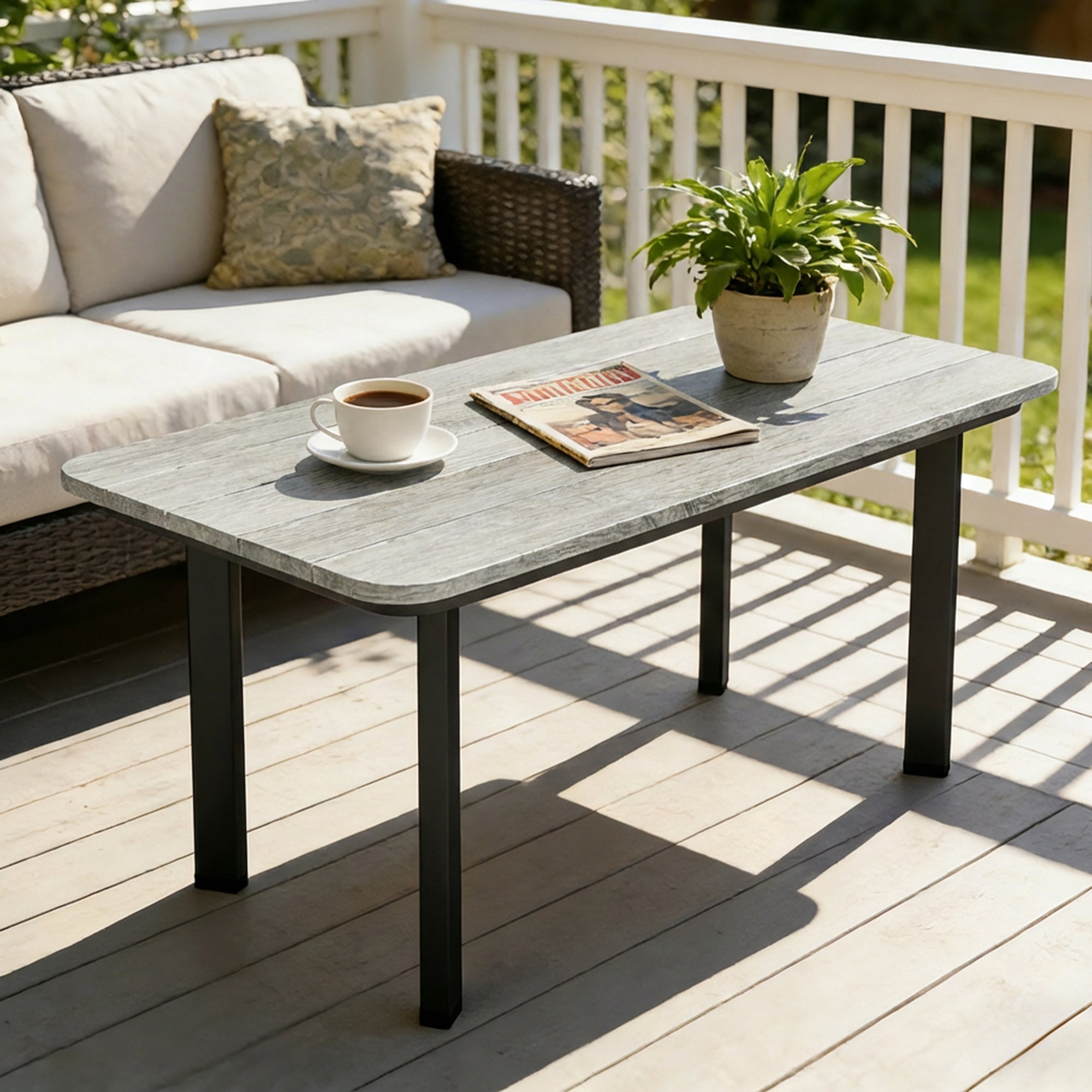 Outsunny outdoor garden coffee table with gray faux-wood slatted top and black metal legs perfect as an outdoor coffee table