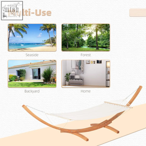 White canvas garden hammock with a curved wooden frame and light wood stand for outdoor patio use