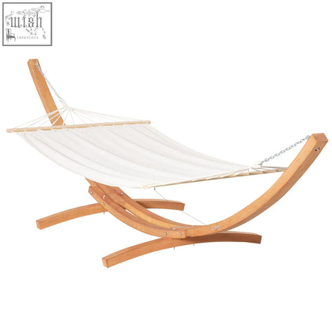 White garden hammock with curved wooden frame and chain attachments perfect for outdoor patio relaxation