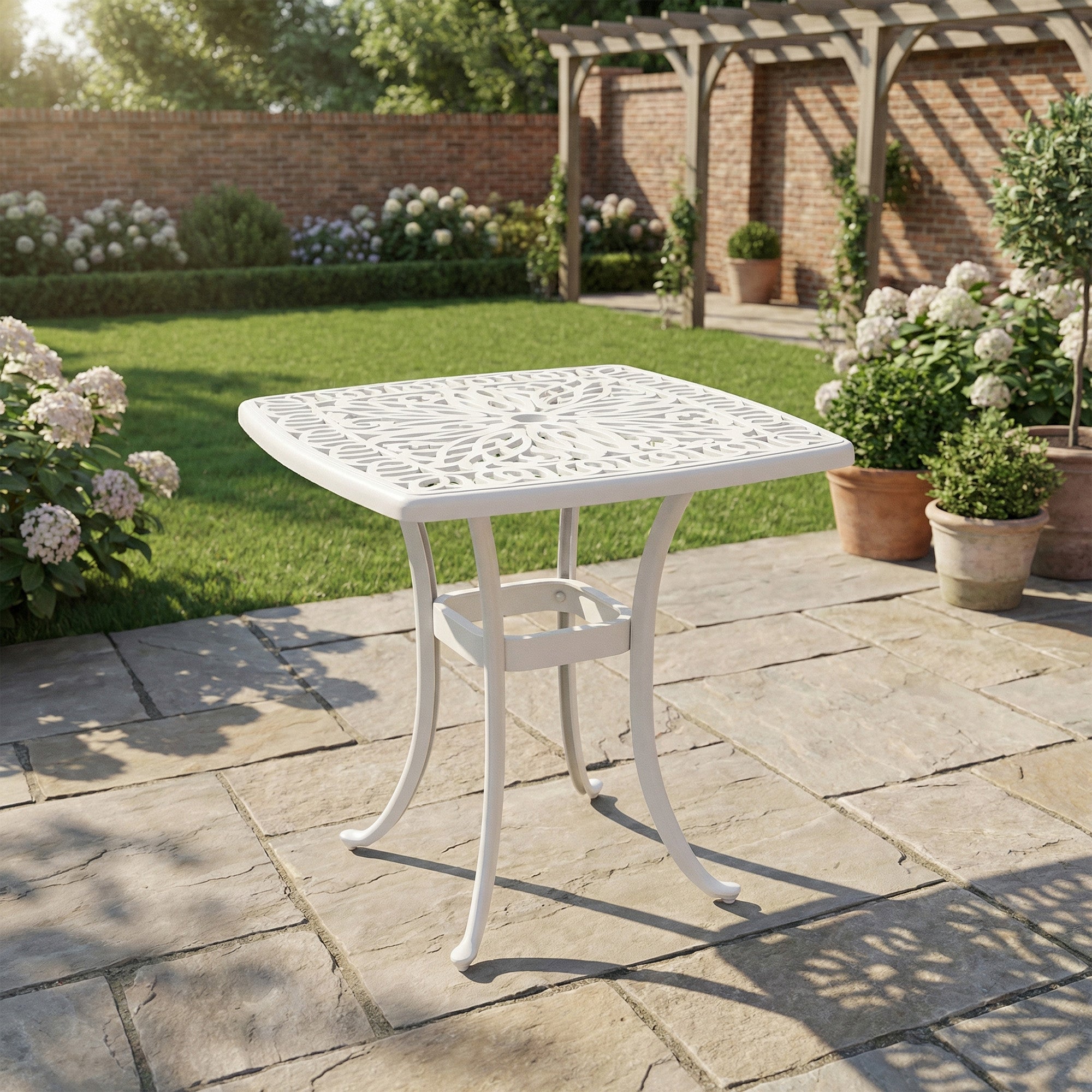 White cast aluminium garden table with floral cut-out design and umbrella hole 54l x 54wcm for outdoor use