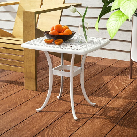 White cast aluminium patio side table with floral cut-out pattern and 54l x 54wcm top with umbrella hole