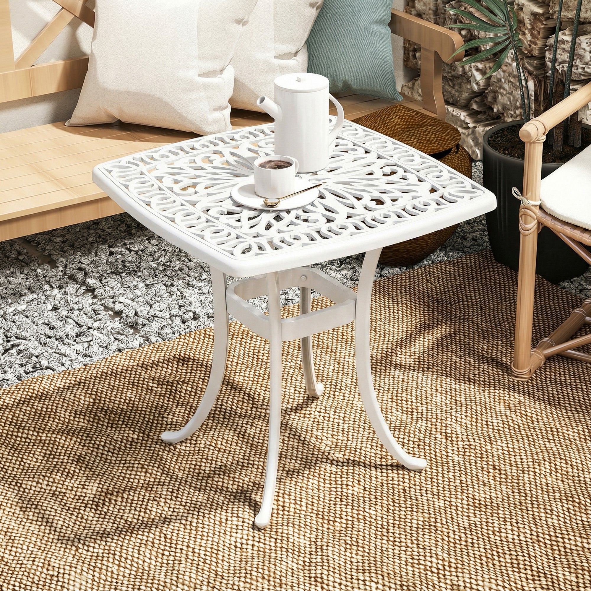 White ornate cast aluminium patio table with floral cut-out patterns and 54l x 54wcm size outdoor garden use