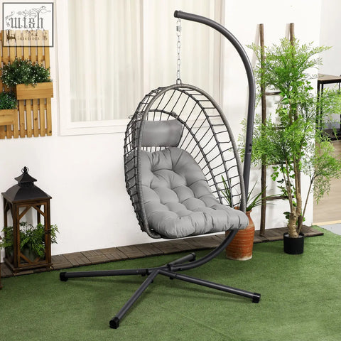 Gray woven wicker hanging egg chair with cushion and powder coated steel frame for indoor and outdoor use