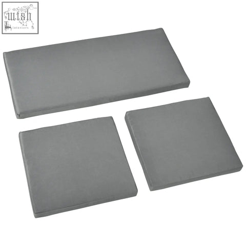 Set of three dark grey plush fabric seat cushions perfect for rattan garden furniture or single and double seats