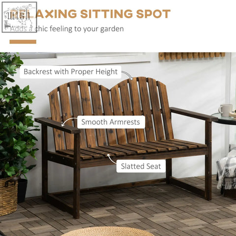 Dark brown solid fir wood adirondack garden bench with slatted seat and carbonised finish for outdoor use