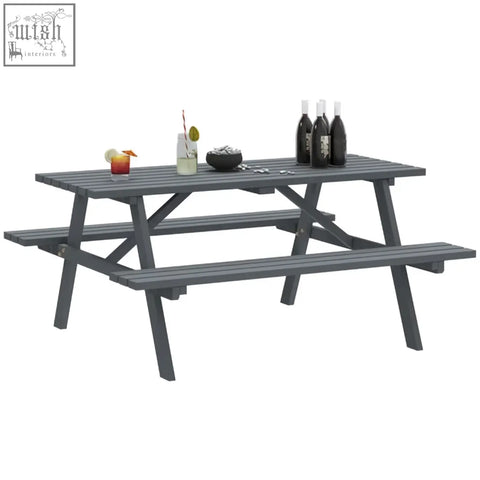Gray plastic picnic table with attached benches featuring parasol hole for outdoor use in garden patio setting