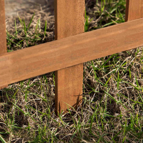 Brown fir wood wooden fence post with horizontal slats for lawn edging in grass from outsunny pack of 12