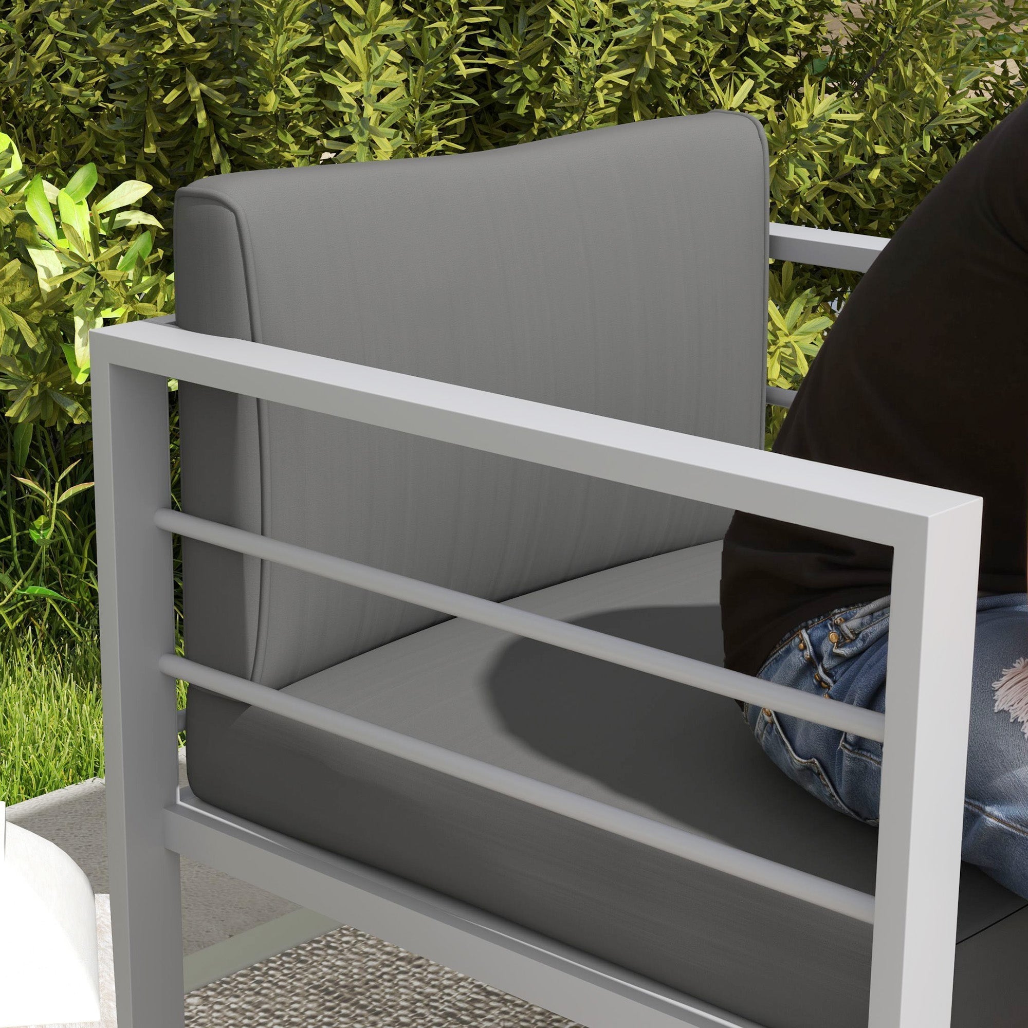 Modern gray outsunny patio armchair with white metal frame, polyester fabric cushions, and thick sponge filling for outdoor use