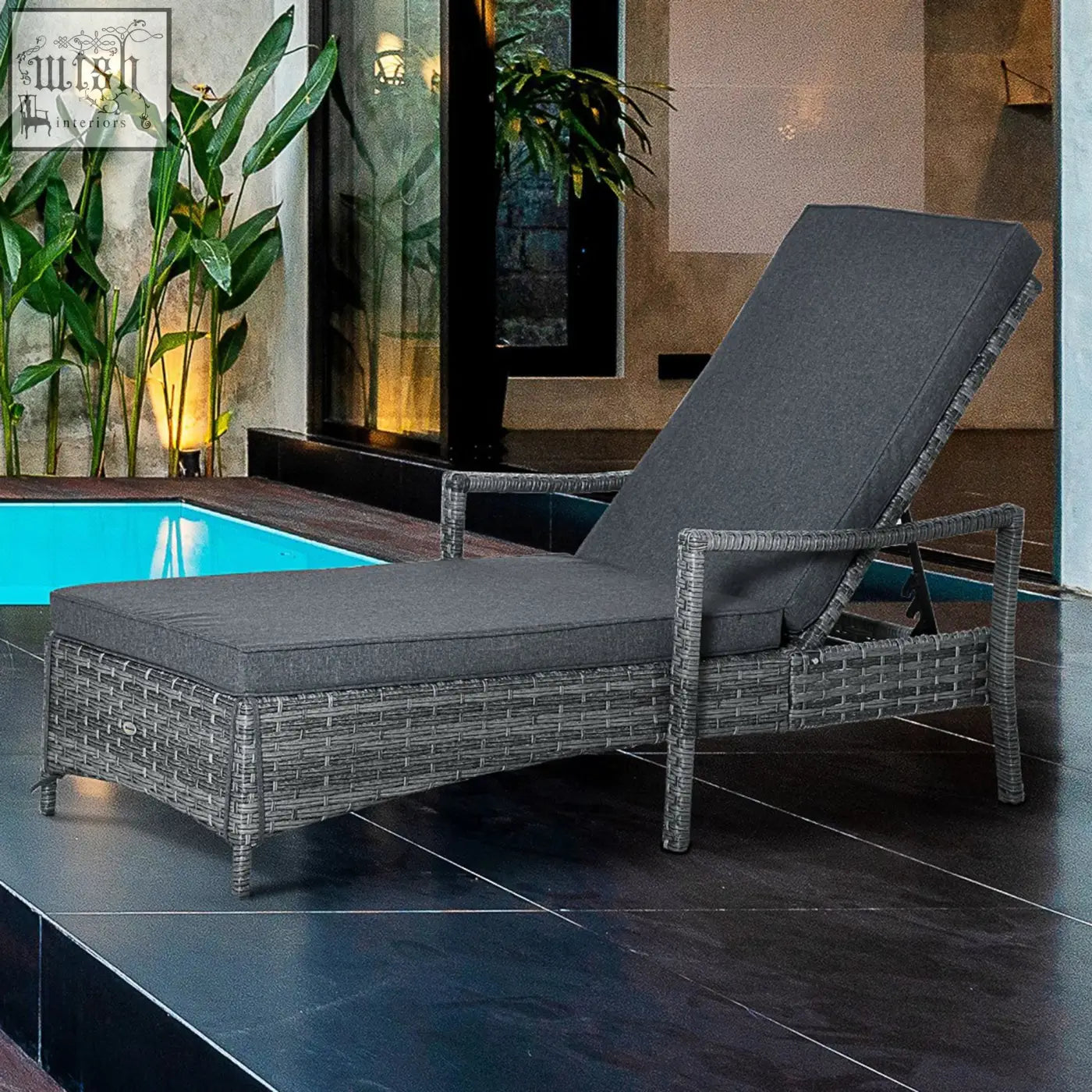 Gray wicker lounge chair with mixed grey rattan and seat cushion perfect for outdoor patio relaxation