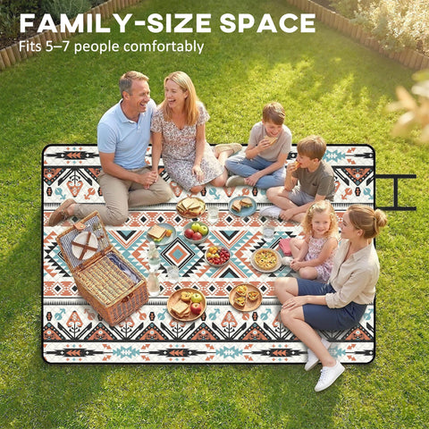 Family-sized outsunny picnic blanket with geometric tribal pattern in brown teal cream and integrated strap for camping mat use