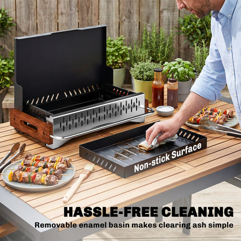 Outsunny portable charcoal grill with black non-stick pan, wooden handle, and stainless steel accents for four people