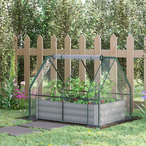 Green-framed outsourced raised garden bed with plastic cover and steel planter box housing green plants