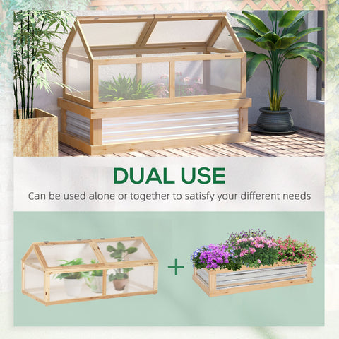 Light-colored wooden cold frame greenhouse with clear glass panels and corrugated metal base for garden protection