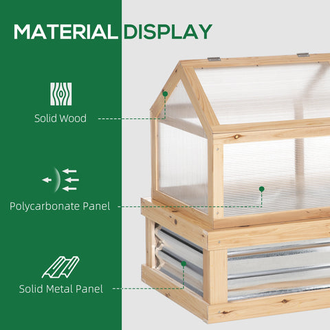 Rustic wooden cold frame greenhouse with clear polycarbonate roof and metal base for raised garden bed protection