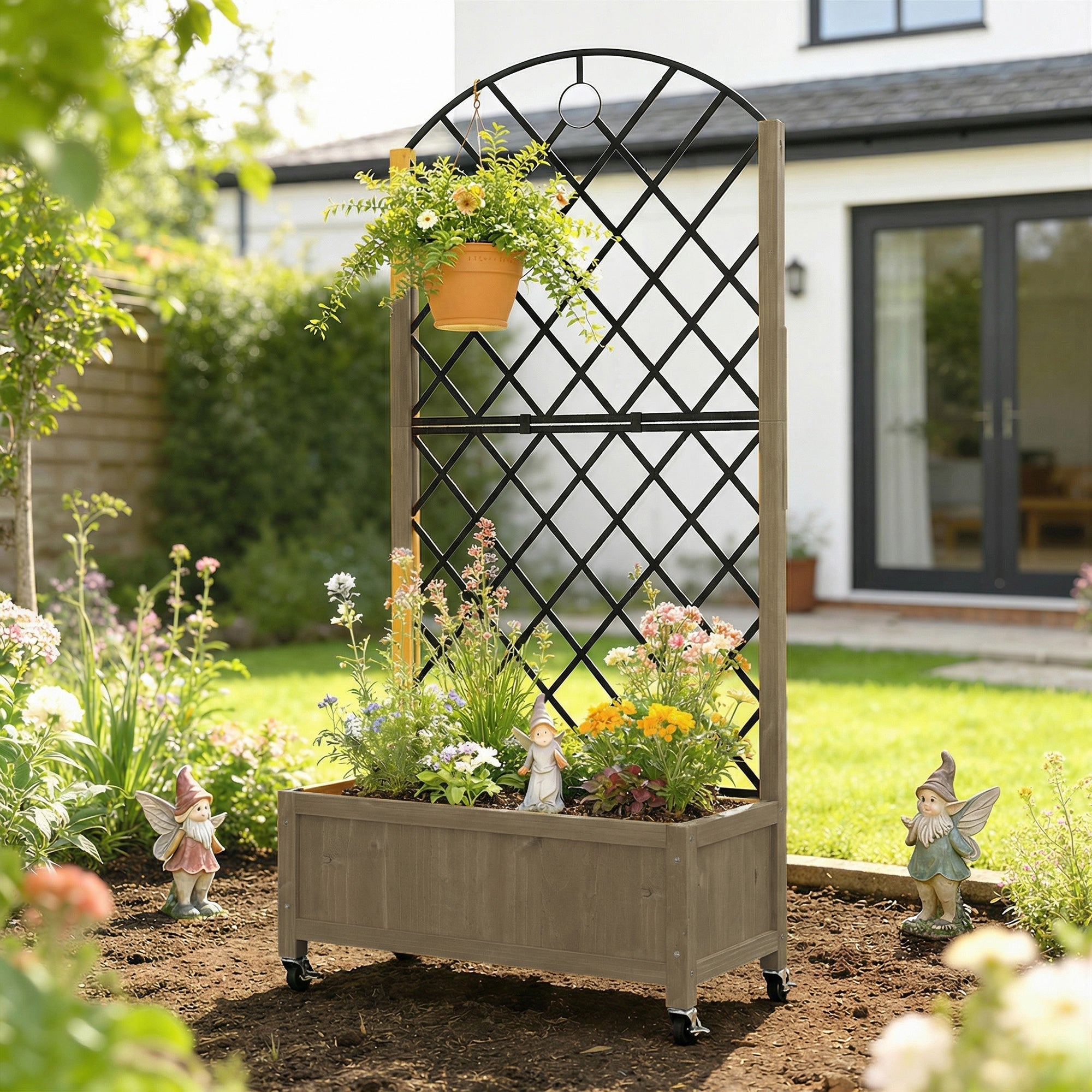 Beige wooden raised garden bed with black metal lattice top and lockable wheels featuring a hanging terracotta pot