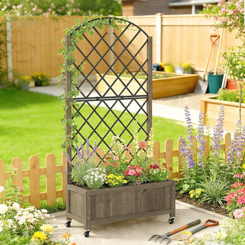 Rustic wooden raised garden bed with black metal lattice trellis and lockable wheels filled with colorful flowers