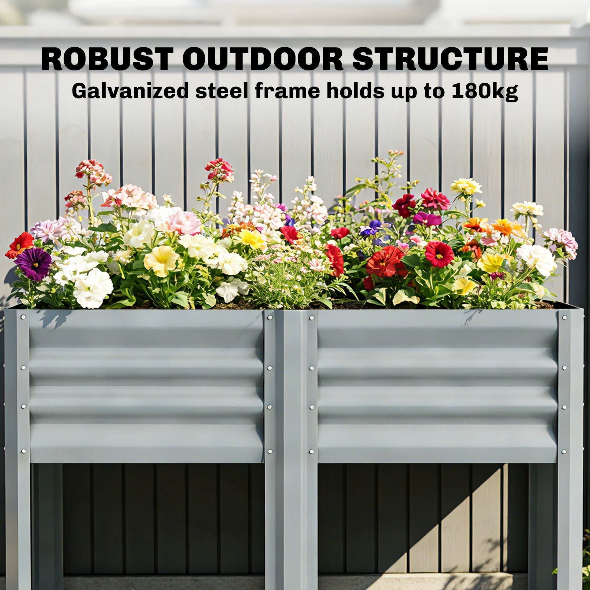 Gray corrugated galvanized steel outsunny raised planter box filled with colorful flowers for outdoor gardening