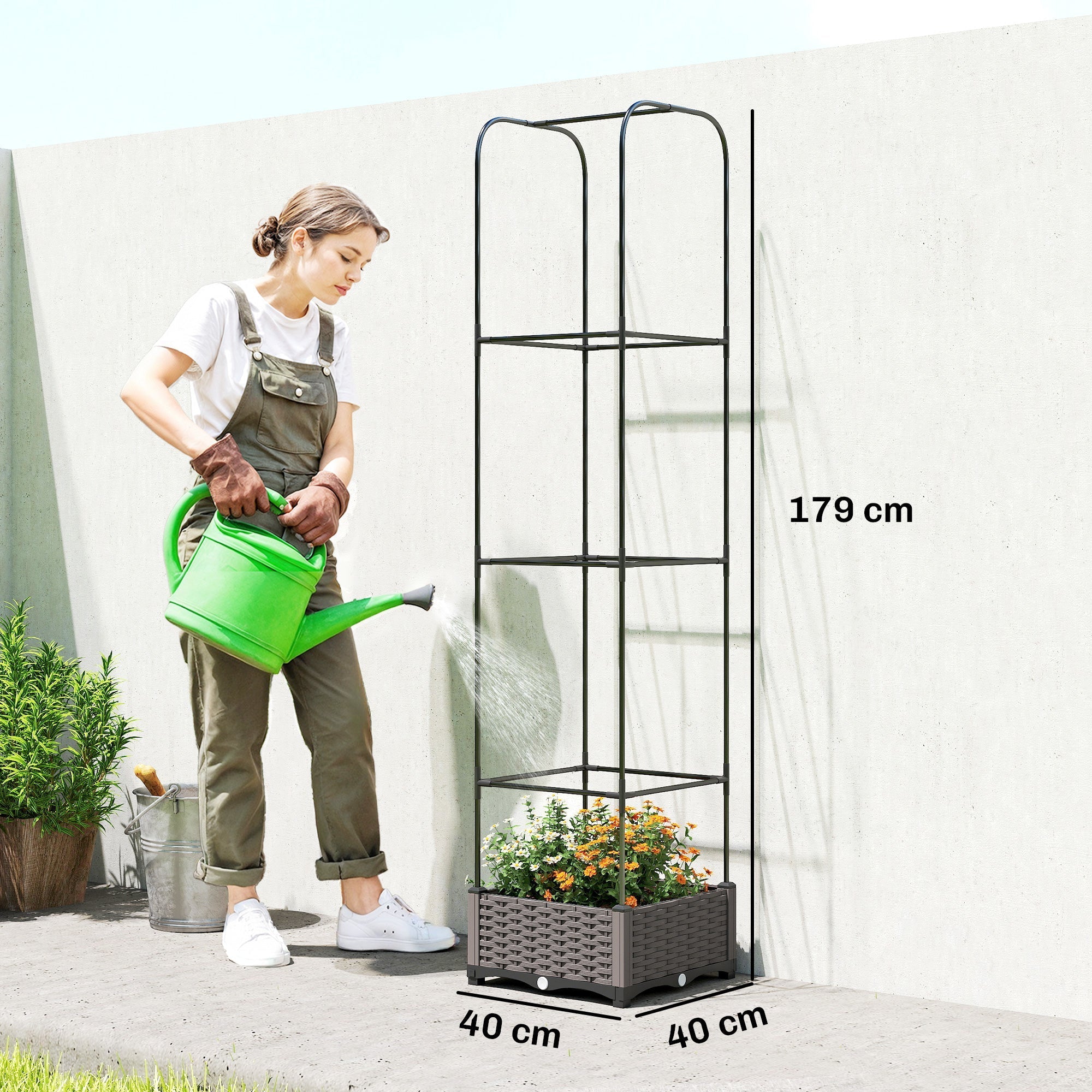 Black metal garden trellis with woven brown plastic base and four shelves in a 179 cm tall outsunny raised garden bed