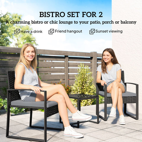 Black wicker Outsunny rattan bistro set with gray cushions and glass top table perfect for outdoor garden use