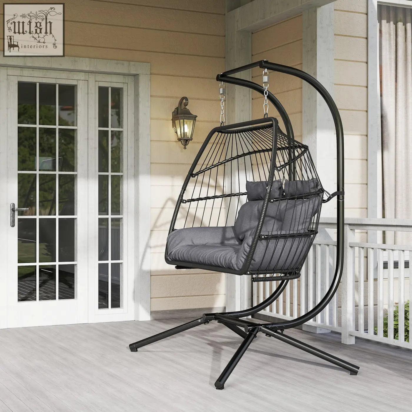 Black metal egg chair with gray cushioned seat and removable headrests featuring chic rope design for indoor outdoor use