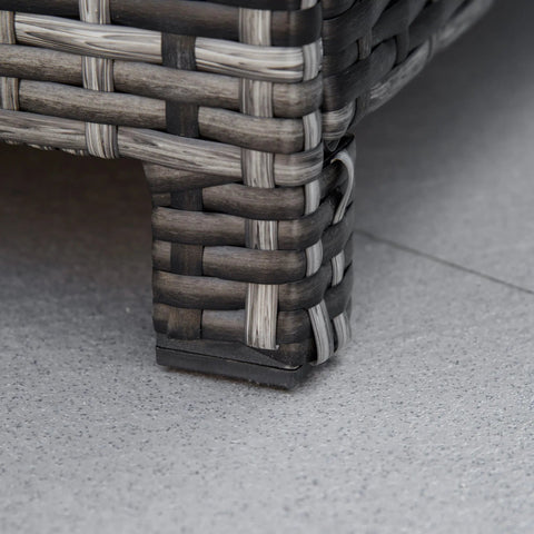 Gray and black woven rattan footstool leg with solid plastic base featuring metal frame for extra seating outdoors