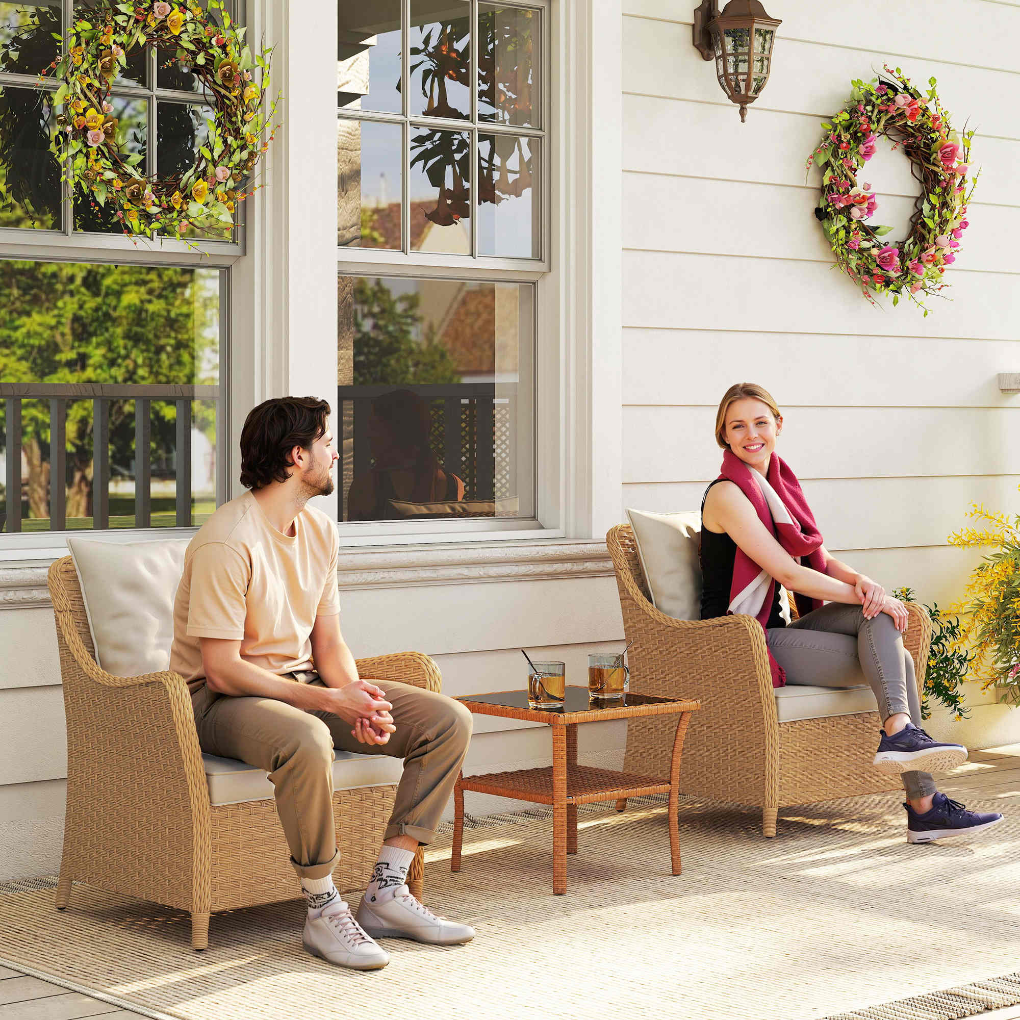 Woven rattan garden chairs set of 2 with beige seat cushions steel frame and wooden legs for outdoor patio use