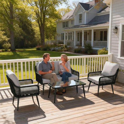 Black woven rattan outdoor patio set with light gray cushions and tempered glass table 68d x 75h for garden or balcony