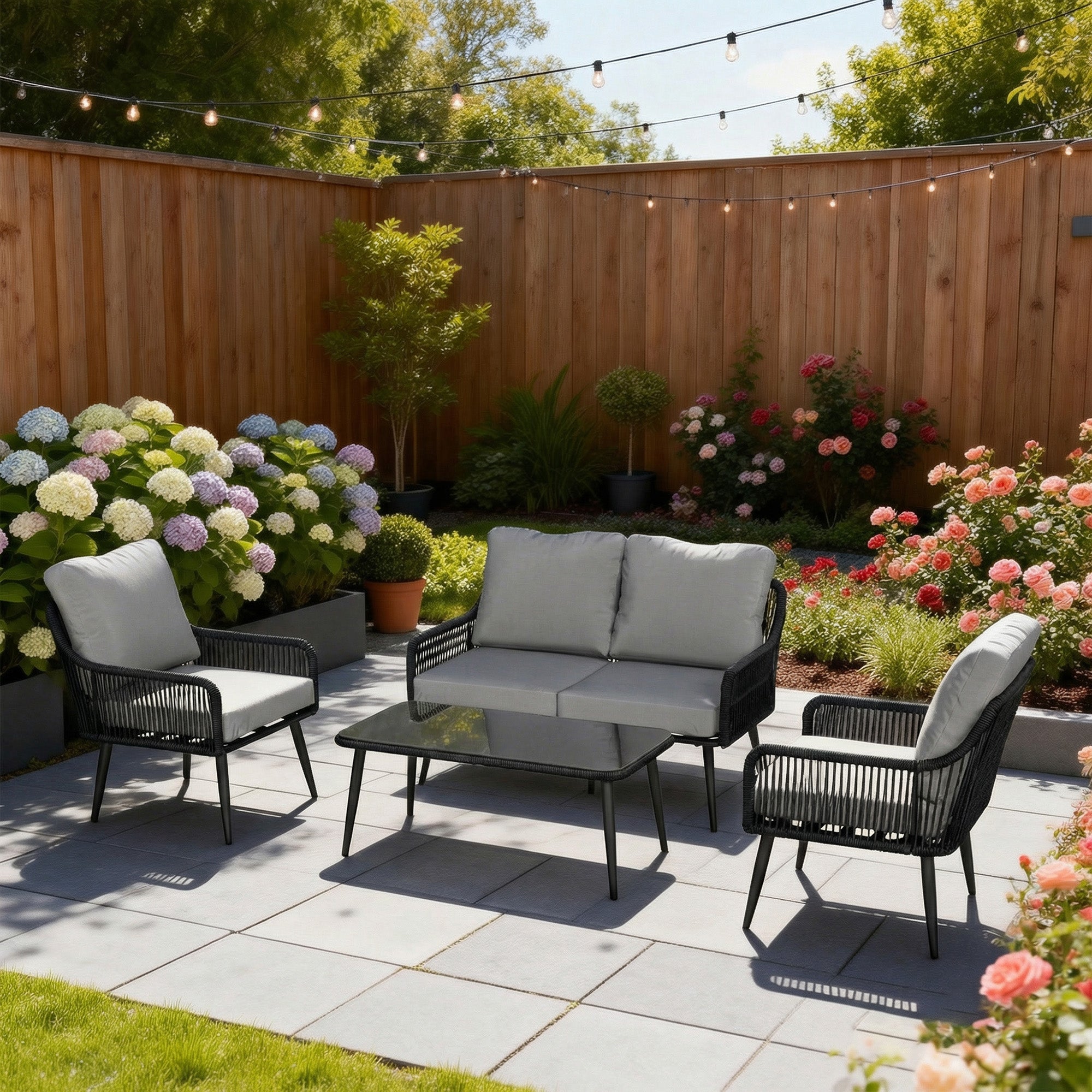 Black wicker outdoor patio set with gray cushions and a tempered glass table 68d x 75h from Outsunny