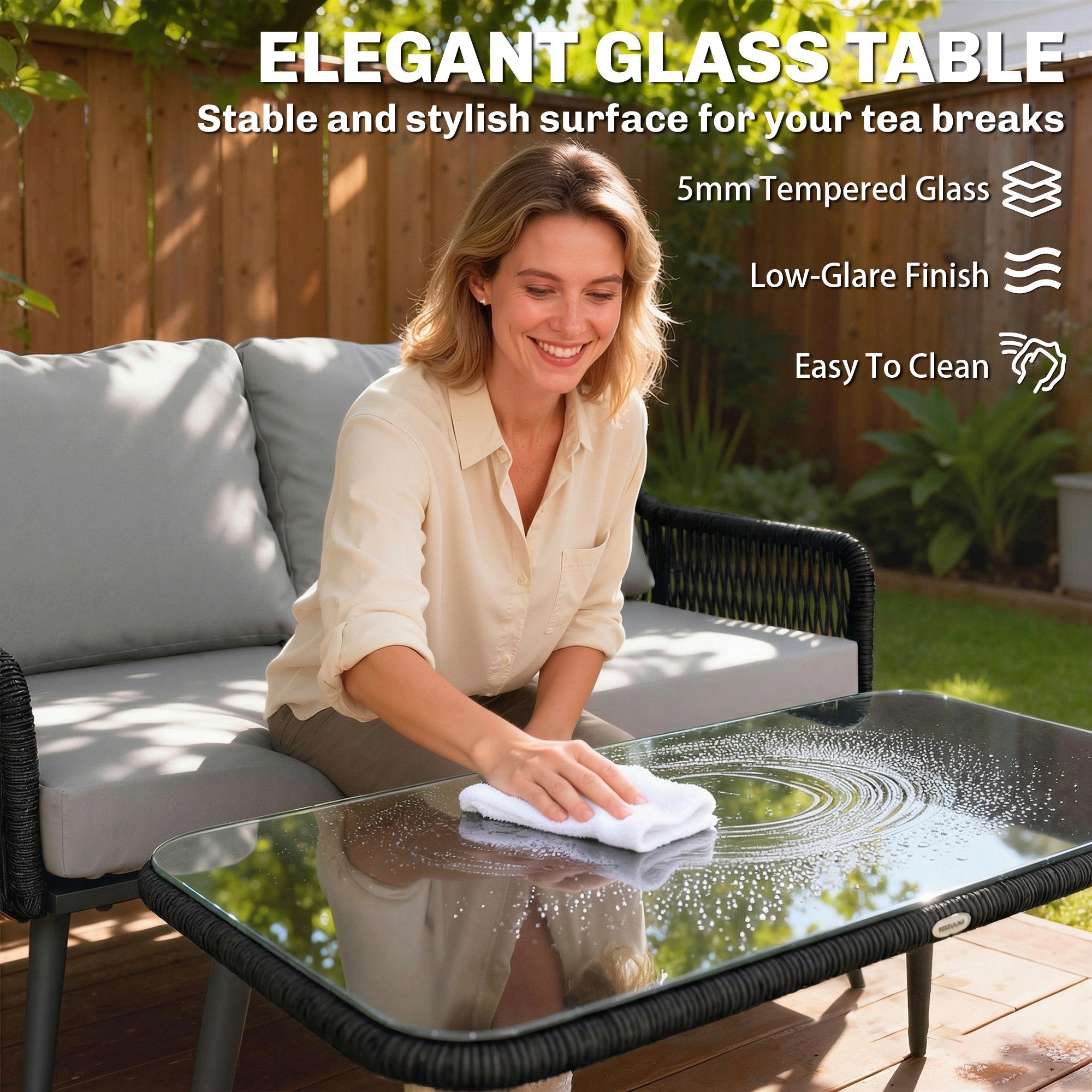 Elegant black woven rattan garden furniture set with 5mm tempered glass table top 68d x 75h for outdoor patio use