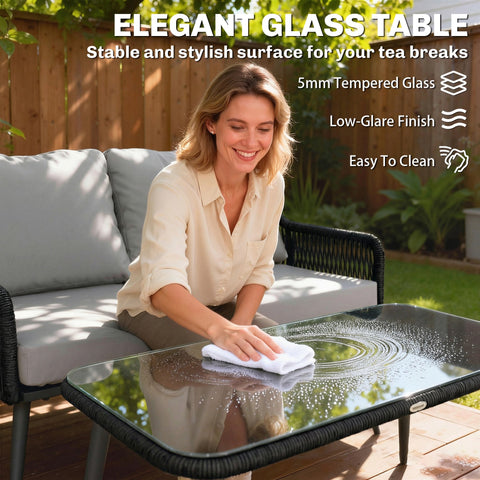 Elegant black woven rattan garden furniture set with 5mm tempered glass table top 68d x 75h for outdoor patio use