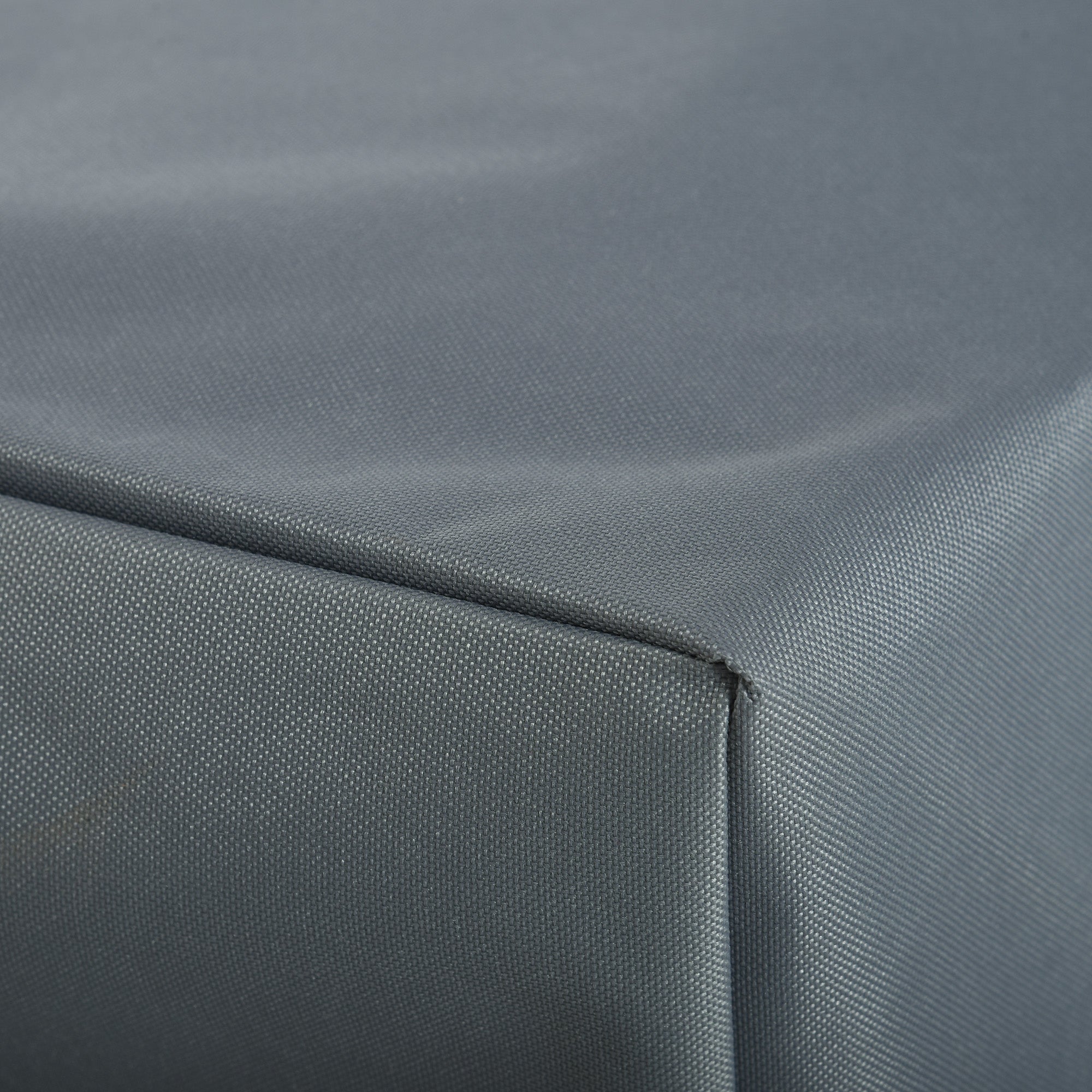 Dark gray textured cushion made of durable 600d oxford fabric with a woven raised surface for outdoor use