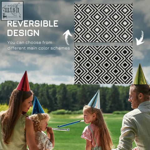 Outsunny reversible outdoor rug in black with plastic straw material carry bag and stakes for garden picnic beach use