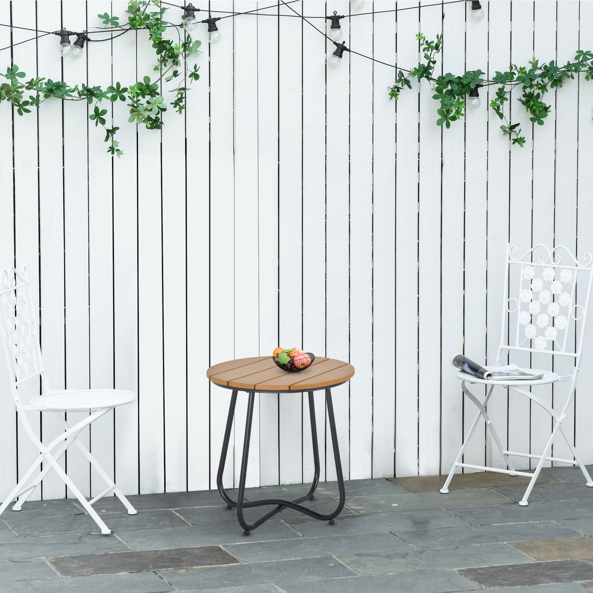 Outsunny round wooden garden table with solid steel black legs and adjustable feet pad for outdoor use