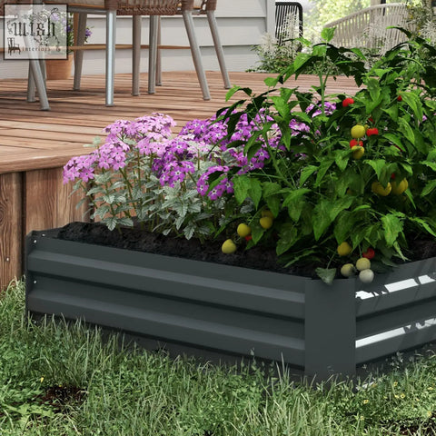 Dark grey corrugated metal raised garden bed from outsunny set of 2 filled with purple flowers and tomato plants