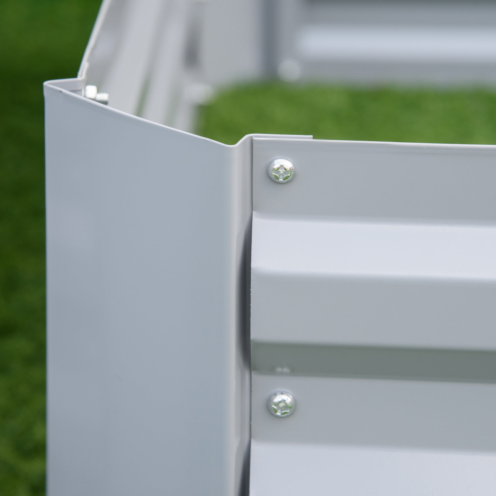 Gray corrugated metal raised garden bed with silver screws from Outsunny set of 2 291L elevated planter box
