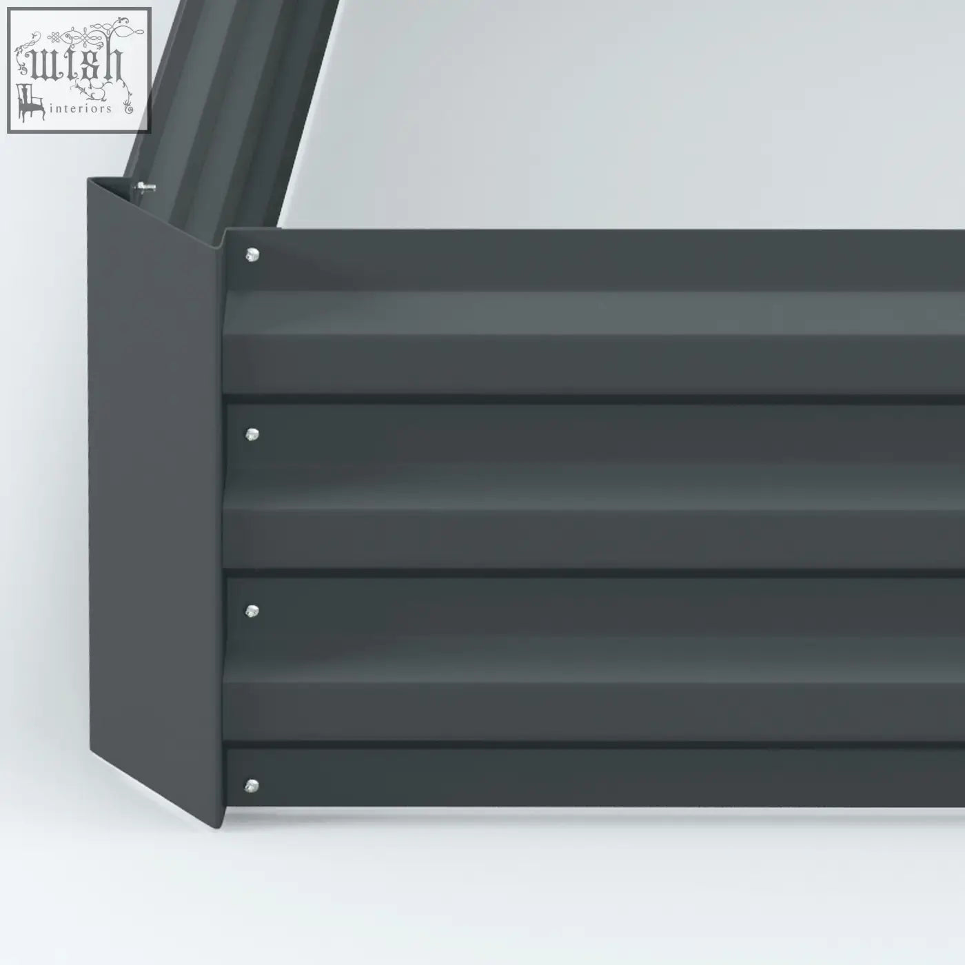 Dark grey metal garden bench with horizontal slats and screws next to Outsunny raised garden bed planter box