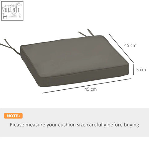 Dark grey rectangular outdoor chair cushion with polyester fabric covers and two tie fastenings for outdoor furniture
