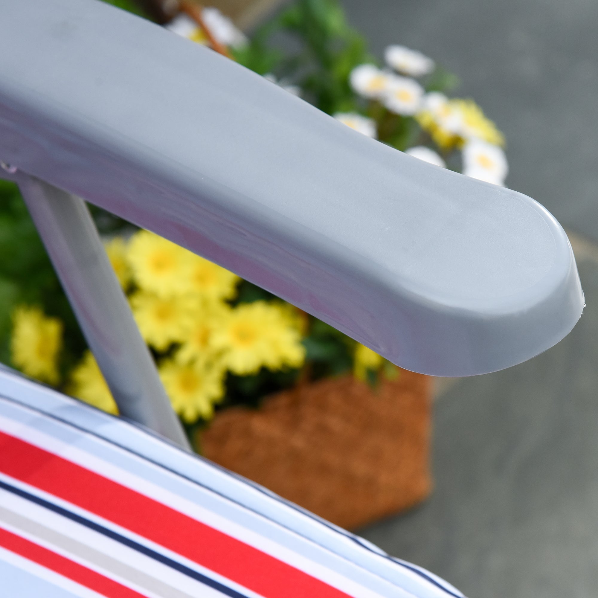 Gray plastic armrest on the outsunny garden sun lounger with grey powder coated tubular steel frame