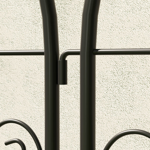Black wrought iron coat rack with curved decorative elements and matte finish offering lots of space for climbing plants